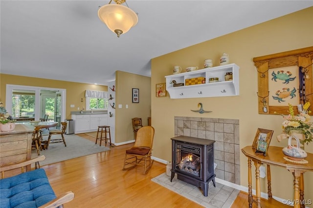 431 Ships Row, Montross, VA 22520 - living room featuring a wood stove and wood finished floors