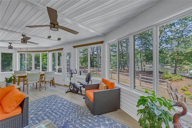 431 Ships Row, Montross, VA 22520 - sunroom / solarium featuring ceiling fan, a wooden deck, outdoor dining area, hardwood / wood-style floors, and beamed ceiling