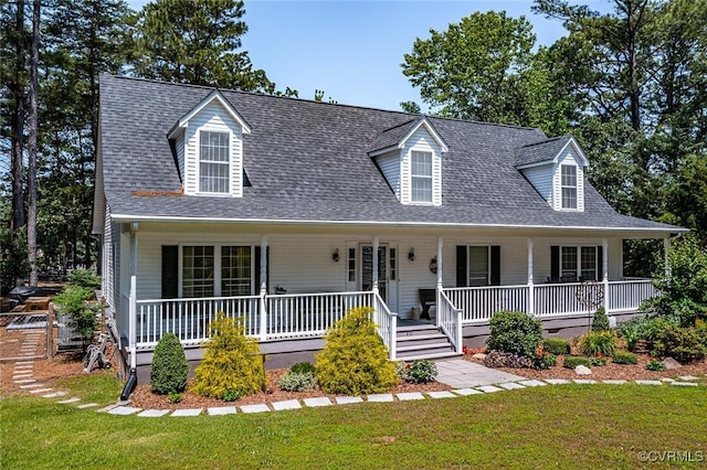 431 Ships Row, Montross, VA 22520 - new england style home with covered porch, a front lawn, and roof with shingles