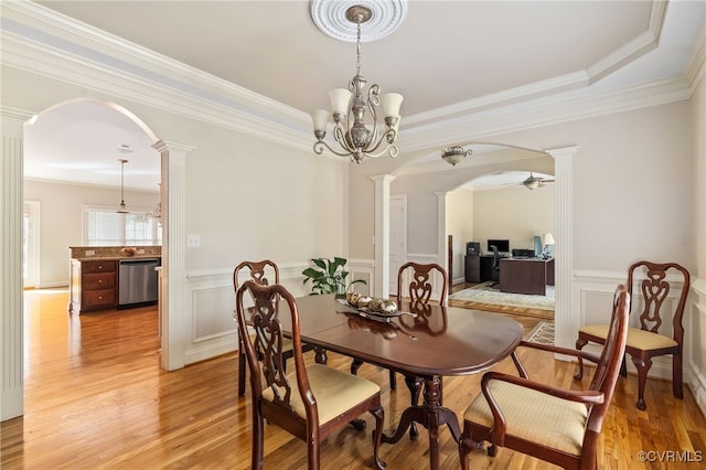 2220 French Hill Ter, Powhatan, VA 23139 - dining space featuring ornate columns, light wood-style floors, arched walkways, an office area, and a wainscoted wall