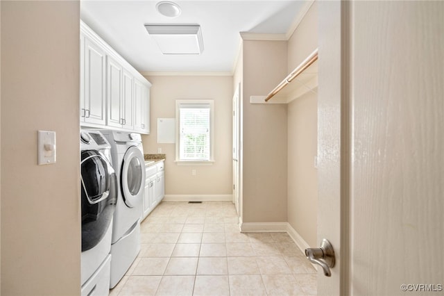 2220 French Hill Ter, Powhatan, VA 23139 - washroom featuring cabinet space, washing machine and clothes dryer, crown molding, light tile patterned flooring, and baseboards