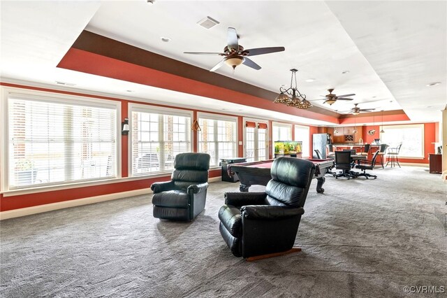 2220 French Hill Ter, Powhatan, VA 23139 - living area with a tray ceiling, carpet flooring, ceiling fan, and baseboards
