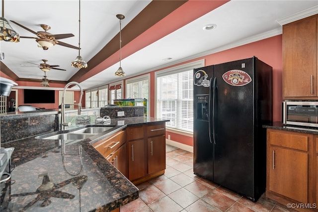 2220 French Hill Ter, Powhatan, VA 23139 - kitchen featuring black refrigerator with ice dispenser, a sink, stainless steel microwave, a ceiling fan, and brown cabinets