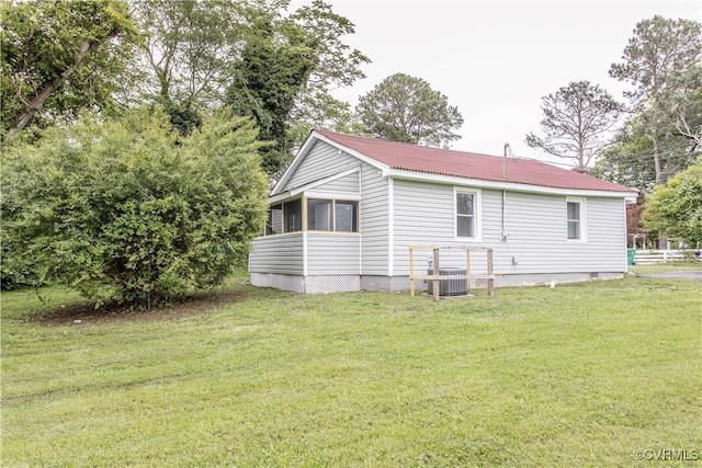 321 Porterville St, Petersburg, VA 23803 - rear view of property with central air condition unit, metal roof, and crawl space
