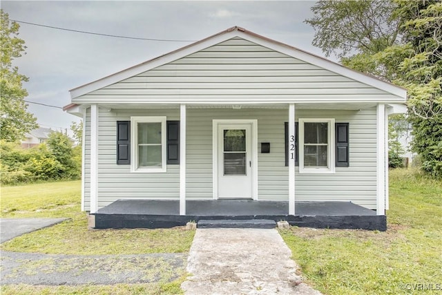 321 Porterville St, Petersburg, VA 23803 - bungalow featuring a porch and a front yard