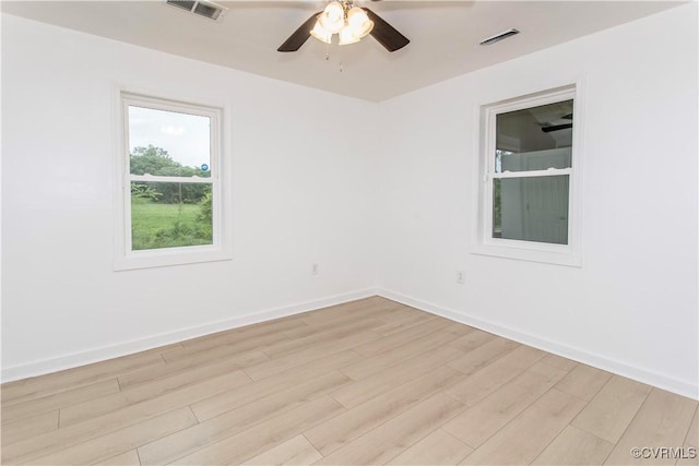 321 Porterville St, Petersburg, VA 23803 - empty room featuring light wood-style floors, ceiling fan, and baseboards