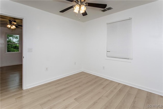 321 Porterville St, Petersburg, VA 23803 - unfurnished room with a ceiling fan, light wood-type flooring, and baseboards