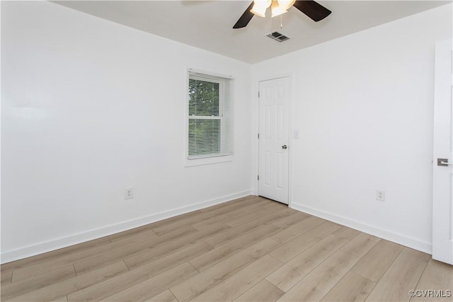 321 Porterville St, Petersburg, VA 23803 - unfurnished room featuring light wood-style floors, ceiling fan, and baseboards
