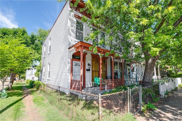 430 S Pine St, Richmond, VA 23220 - view of front of house featuring covered porch and a fenced front yard