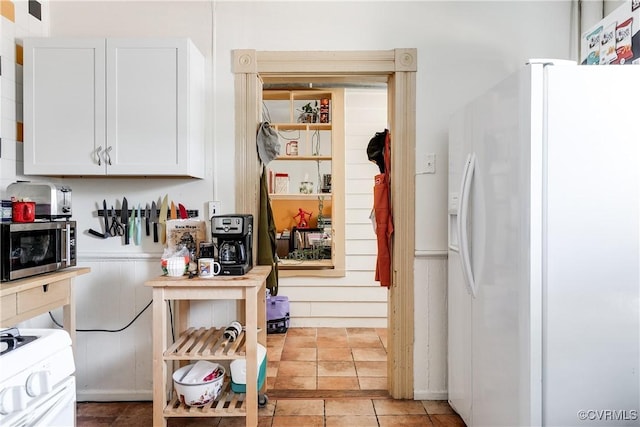 430 S Pine St, Richmond, VA 23220 - kitchen featuring white appliances and white cabinets