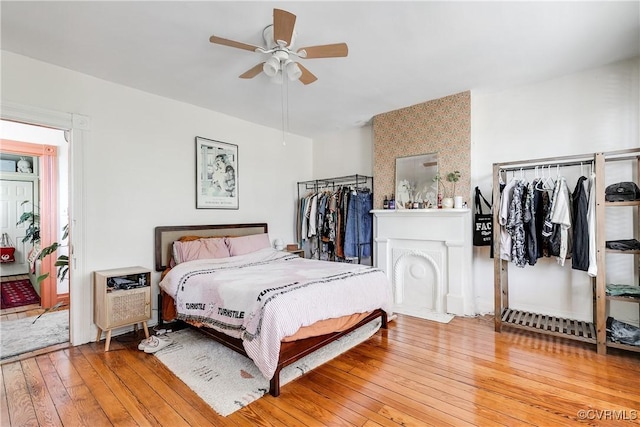 430 S Pine St, Richmond, VA 23220 - bedroom with wood-type flooring, a ceiling fan, and heating unit