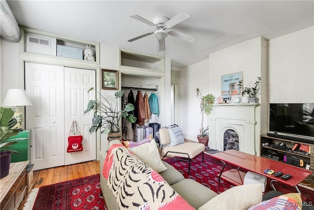 430 S Pine St, Richmond, VA 23220 - living area with ceiling fan, a fireplace, and wood-type flooring