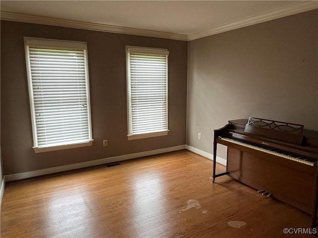8172 Dunfee Ln, Mechanicsville, VA 23111 - unfurnished room featuring baseboards, wood finished floors, and ornamental molding