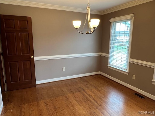 8172 Dunfee Ln, Mechanicsville, VA 23111 - spare room with a chandelier, wood finished floors, baseboards, and crown molding