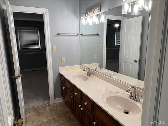 8172 Dunfee Ln, Mechanicsville, VA 23111 - full bath featuring double vanity and baseboards