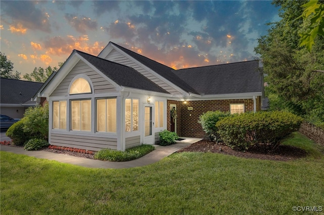 1314 Tannery Cir, Midlothian, VA 23113 - view of front of house with roof with shingles, a yard, and brick siding