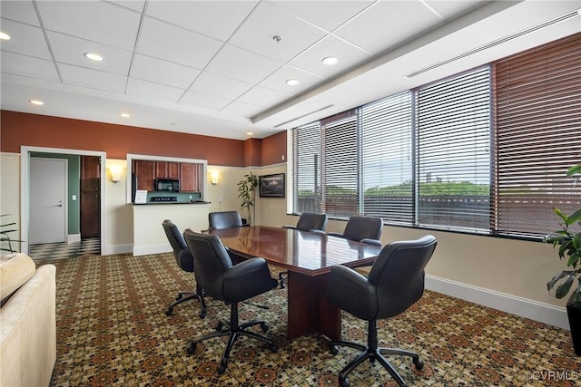 1101 Haxall Pt Unit U1001, Richmond, VA 23219 - carpeted dining space featuring baseboards, a tray ceiling, and recessed lighting