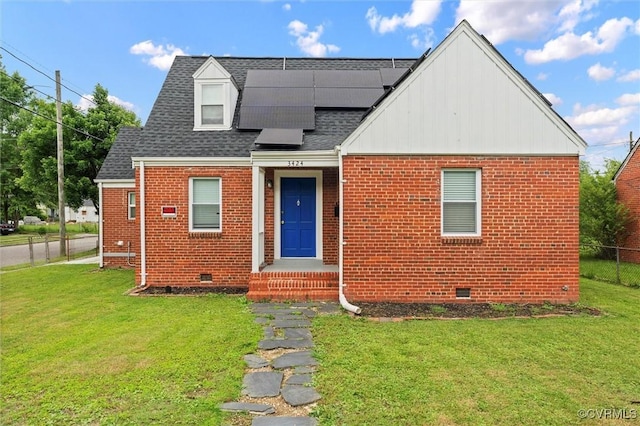 3424 Danbury Rd, Richmond, VA 23234 - view of front of home with crawl space, brick siding, solar panels, and roof with shingles
