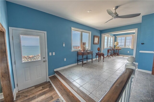 154 Riverside Dr, Deltaville, VA 23043 - tiled entrance foyer featuring a ceiling fan and baseboards