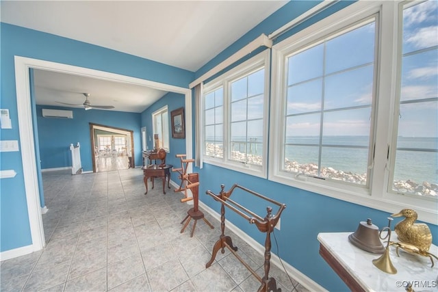154 Riverside Dr, Deltaville, VA 23043 - sunroom / solarium featuring a water view and a wall unit AC