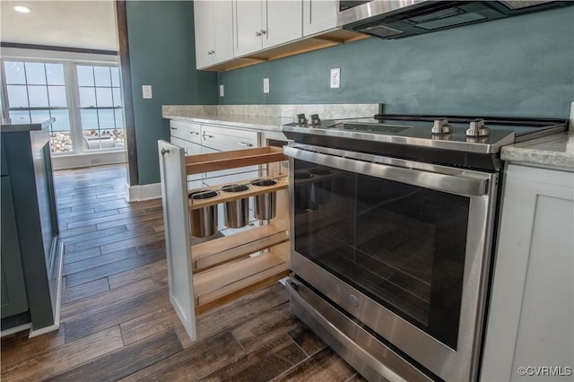 154 Riverside Dr, Deltaville, VA 23043 - kitchen featuring stainless steel electric range, dark wood-type flooring, white cabinetry, and recessed lighting