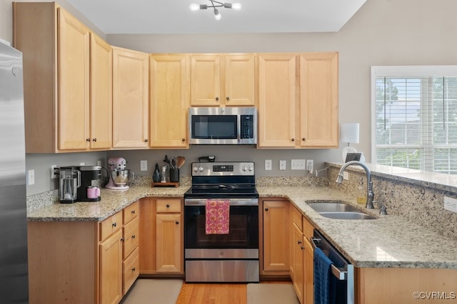 14825 Windjammer Dr, Midlothian, VA 23112 - kitchen featuring stainless steel appliances, light brown cabinetry, and a peninsula