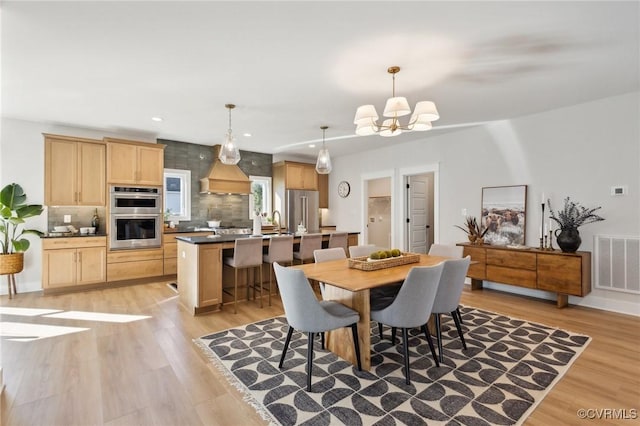 9463 Angels Share Dr, New Kent, VA 23124 - dining space featuring a chandelier, light wood-style flooring, and recessed lighting