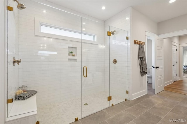 9463 Angels Share Dr, New Kent, VA 23124 - bathroom with a stall shower, toilet, recessed lighting, and tile patterned flooring