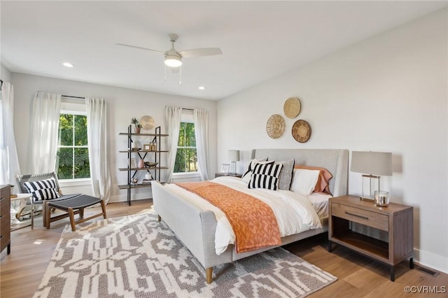 9463 Angels Share Dr, New Kent, VA 23124 - bedroom with multiple windows, wood finished floors, and recessed lighting