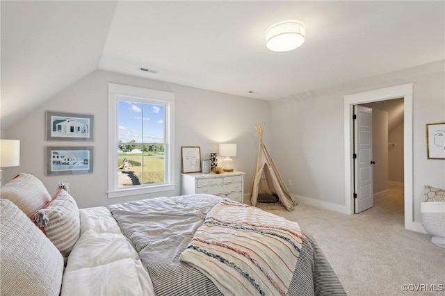 9463 Angels Share Dr, New Kent, VA 23124 - bedroom featuring light carpet, vaulted ceiling, and baseboards