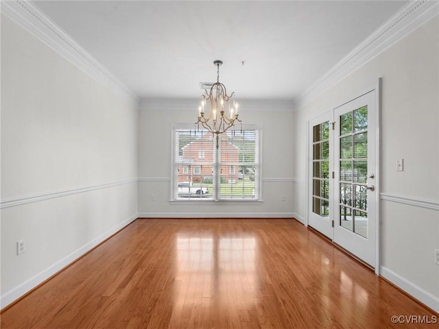 5241 Monument Ave Unit 2A, Henrico, VA 23226 - unfurnished dining area featuring a chandelier, plenty of natural light, wood finished floors, and ornamental molding