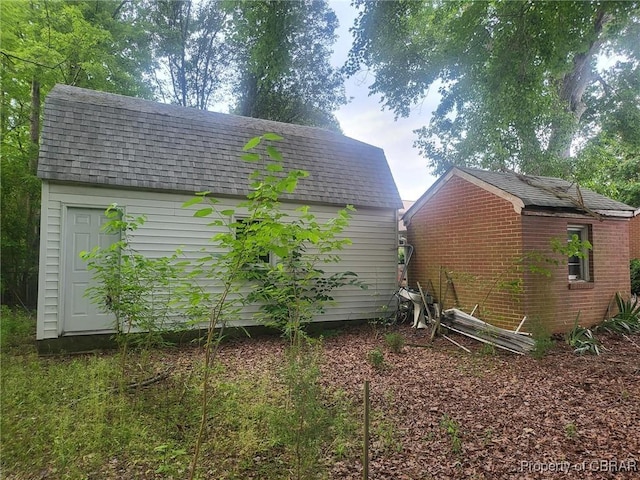 72 Cline Dr, Newport News, VA 23666 - view of side of home featuring a shingled roof