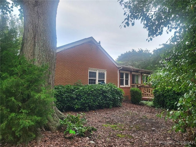 72 Cline Dr, Newport News, VA 23666 - view of home's exterior featuring brick siding and a wooden deck