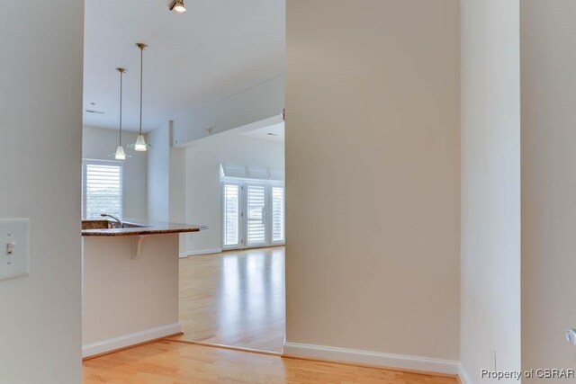 670 Town Center Dr Unit 418, Newport News, VA 23606 - hall with light wood-type flooring and baseboards
