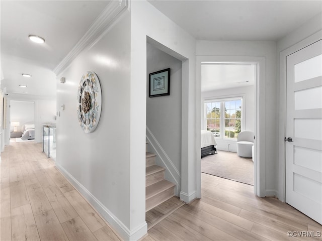 11507 Barrington Bridge Ter, Henrico, VA 23233 - hallway with light wood finished floors, ornamental molding, stairway, and recessed lighting