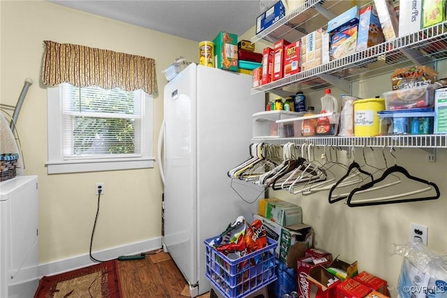 725 Transco Rd, Scottsville, VA 24590 - laundry room with wood finished floors and baseboards