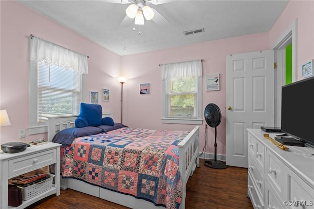 725 Transco Rd, Scottsville, VA 24590 - bedroom with dark wood-style floors and a ceiling fan