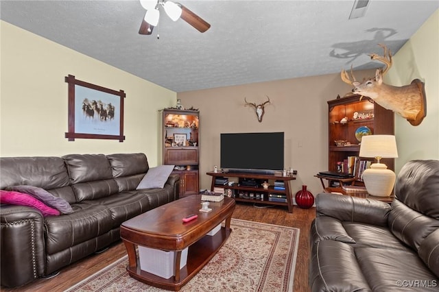 725 Transco Rd, Scottsville, VA 24590 - living area featuring a ceiling fan, wood finished floors, and a textured ceiling