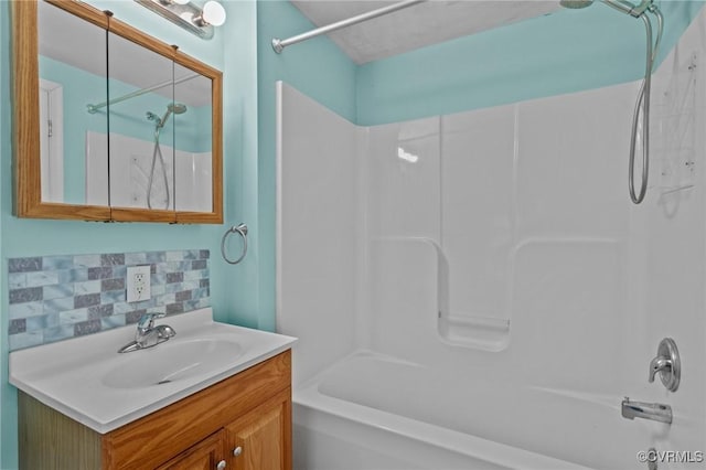 725 Transco Rd, Scottsville, VA 24590 - bathroom with washtub / shower combination, vanity, and backsplash