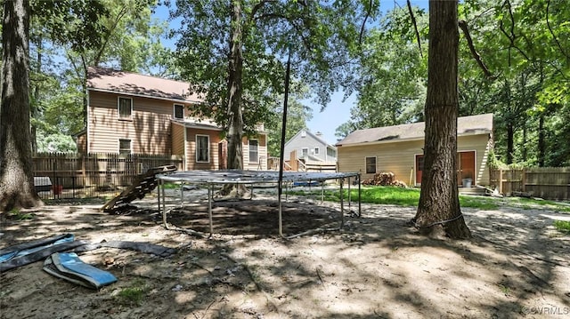 3913 Terjo Ln, Chester, VA 23831 - back of property featuring a trampoline
