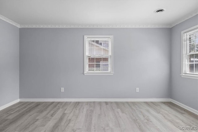 807 N Ave, Hopewell, VA 23860 - unfurnished room featuring ornamental molding, light wood-type flooring, and baseboards