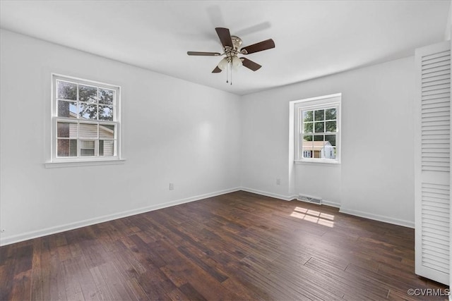 807 N Ave, Hopewell, VA 23860 - unfurnished room featuring a ceiling fan, hardwood / wood-style floors, and baseboards