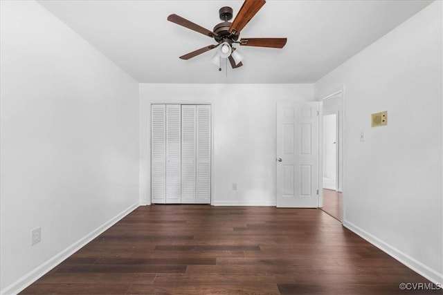 807 N Ave, Hopewell, VA 23860 - unfurnished bedroom featuring wood finished floors, a closet, baseboards, and a ceiling fan