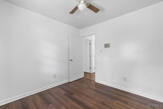 807 N Ave, Hopewell, VA 23860 - spare room featuring baseboards, ceiling fan, and dark wood finished floors