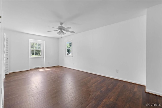 807 N Ave, Hopewell, VA 23860 - empty room featuring ceiling fan, dark wood-style flooring, and baseboards