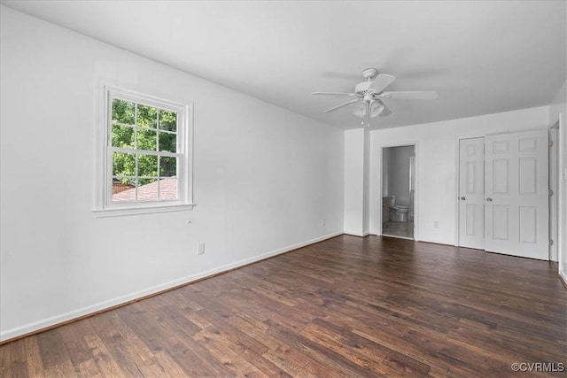 807 N Ave, Hopewell, VA 23860 - unfurnished bedroom with wood finished floors, baseboards, ensuite bath, and ceiling fan