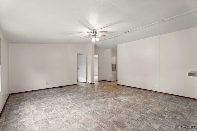 1426 Rolling Acres Rd, Emporia, VA 23847 - empty room with ceiling fan and vaulted ceiling