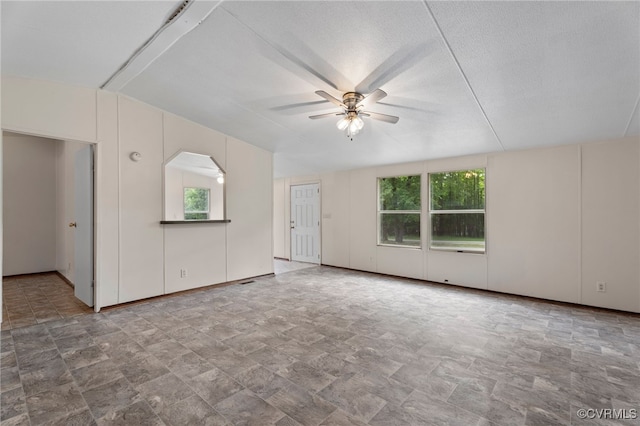 1426 Rolling Acres Rd, Emporia, VA 23847 - unfurnished living room featuring a ceiling fan and stone finish floors