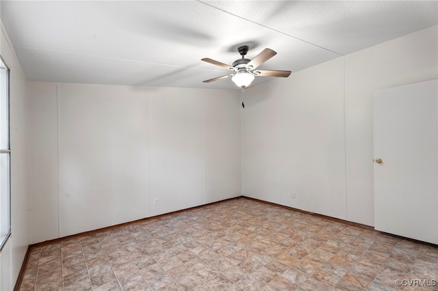 1426 Rolling Acres Rd, Emporia, VA 23847 - unfurnished room featuring ceiling fan and stone finish flooring