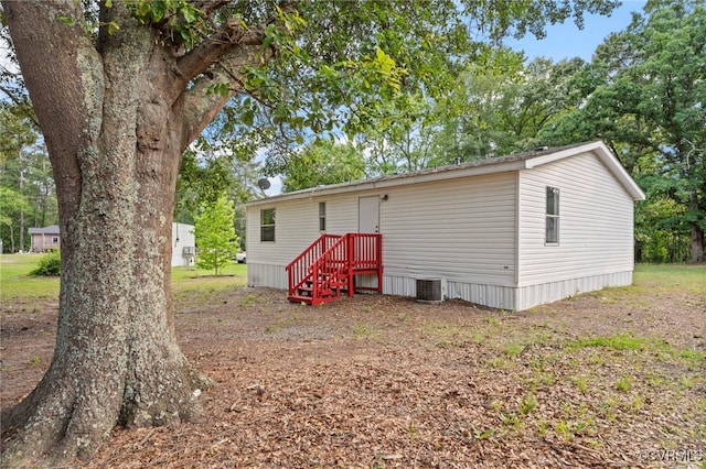 1426 Rolling Acres Rd, Emporia, VA 23847 - rear view of property featuring central AC unit